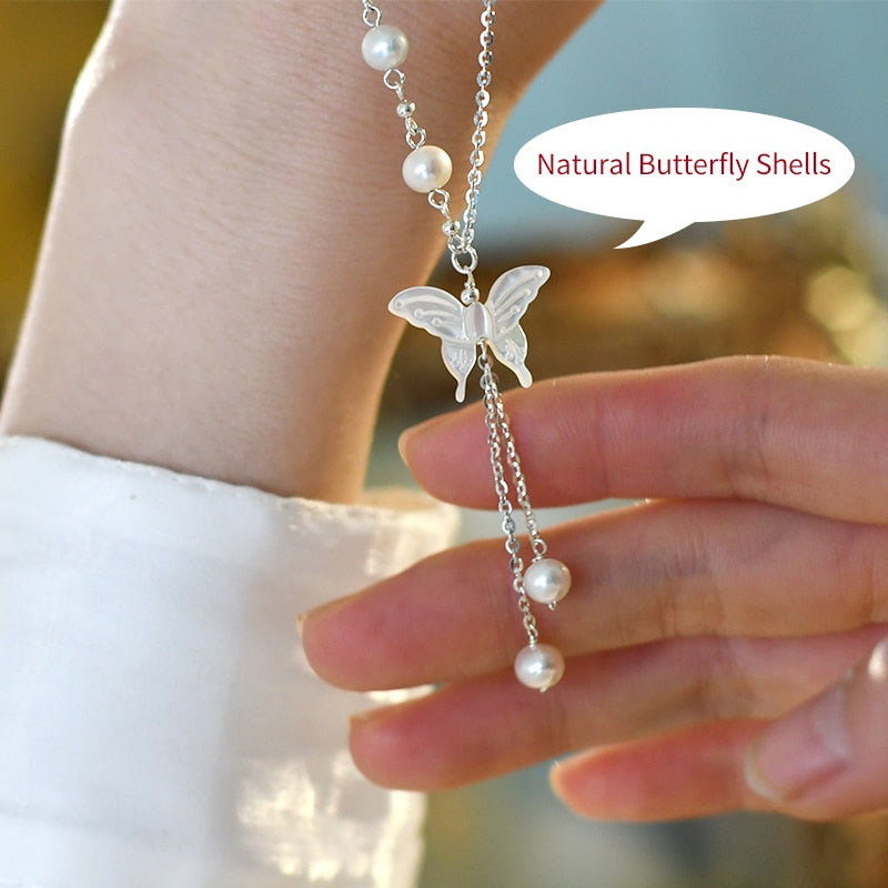 Dazzling White Pearl Necklace With A Glamorous Pendant Studded With AD &  Red crystal - Pure Pearls